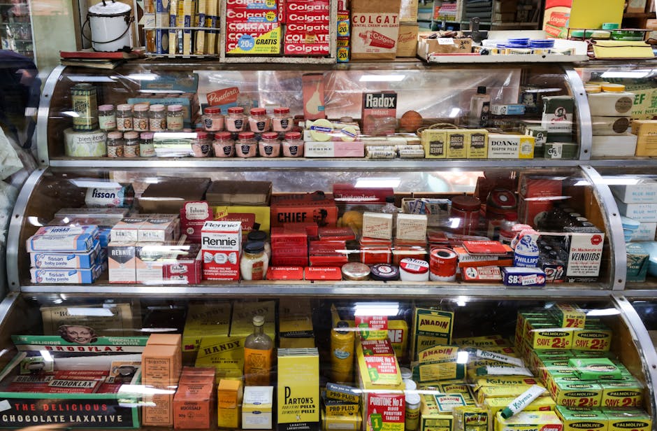 A nostalgic view of vintage pharmacy products displayed in a retro shop setting.