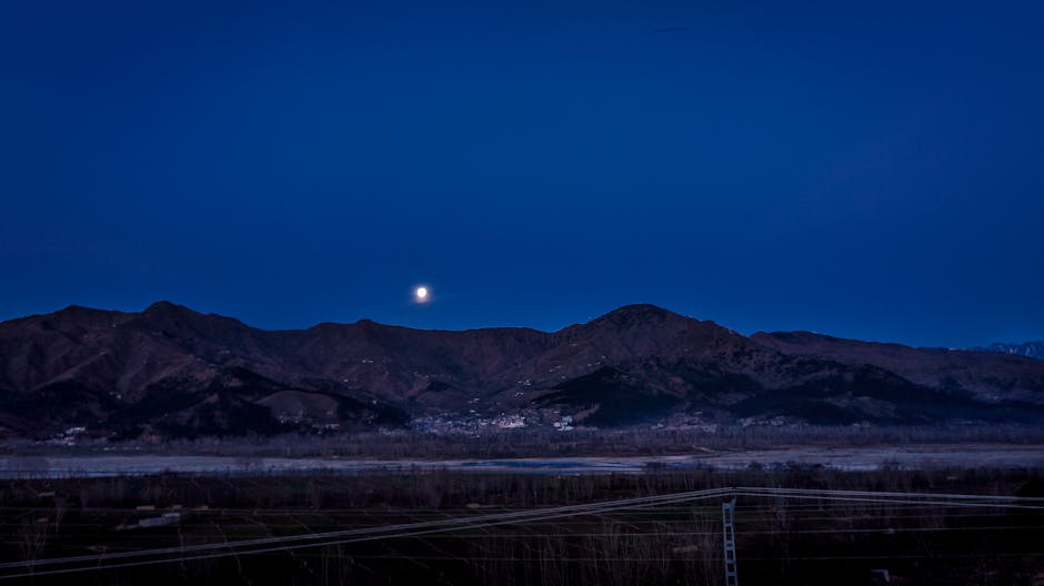 Scenic view of moonlit mountains at night in Kalam, Khyber Pakhtunkhwa, Pakistan.